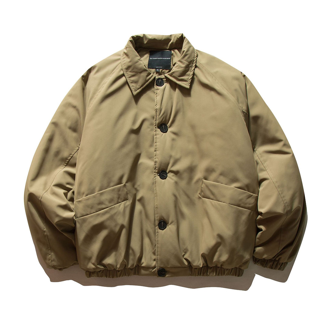 Men's short padded jacket with raglan sleeves, large flap pockets, and elastic hem Mune Fashion