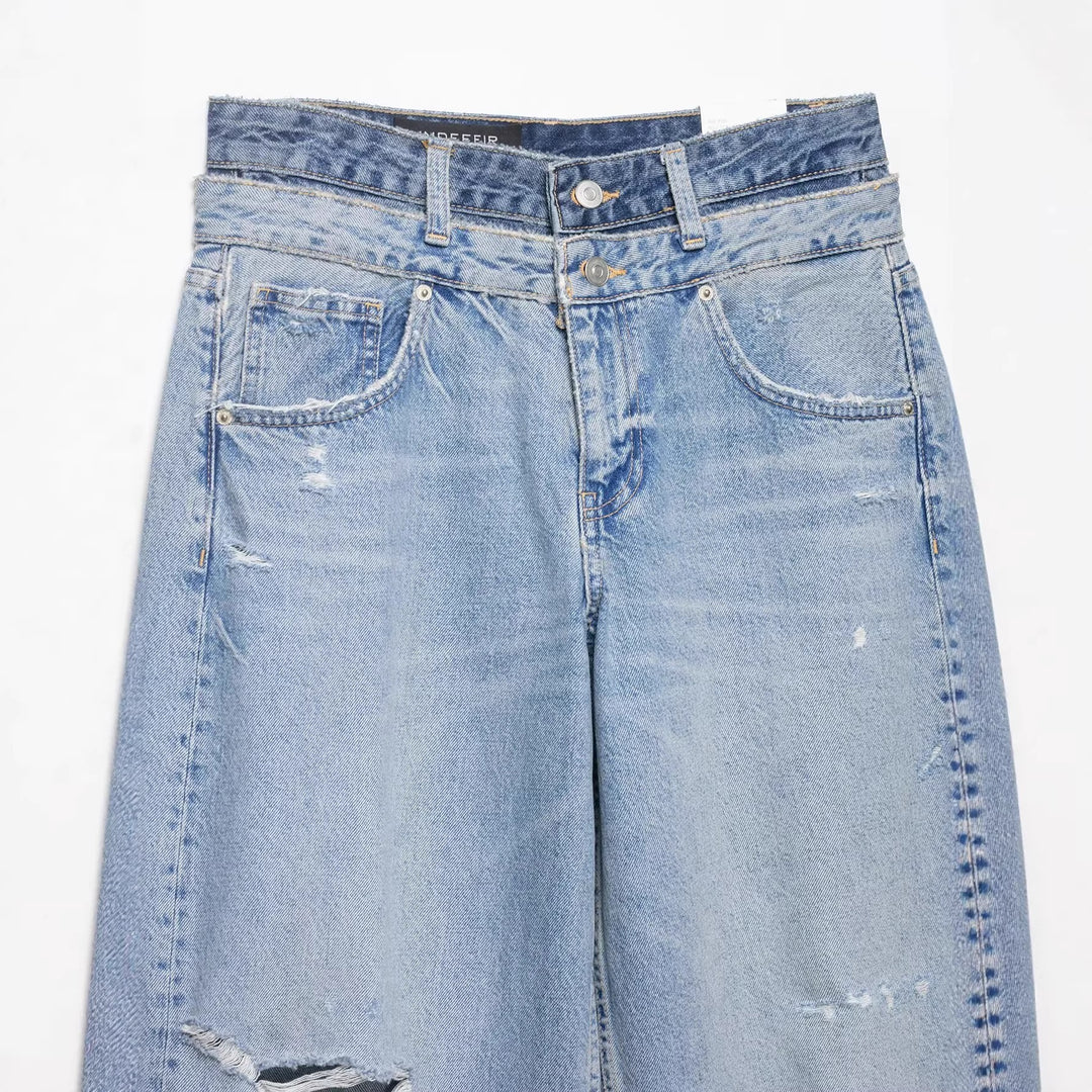Ladies wide waist high jeans with washed finish and rips Mune Fashion