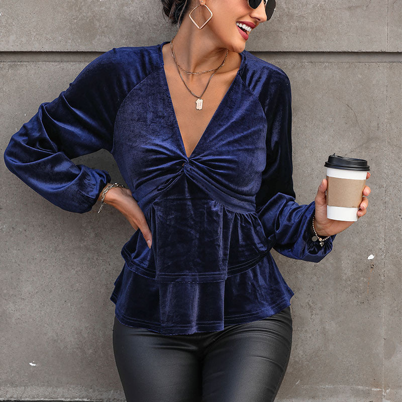 Ladies velvet blouse with deep V-neck, twist detail and two-tiered ruffle drape