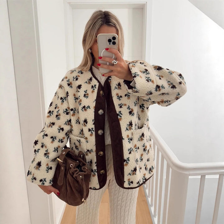 Women's teddy fleece jacket with floral print, cord placket, patch pockets, and oversized lace collar Mune Fashion