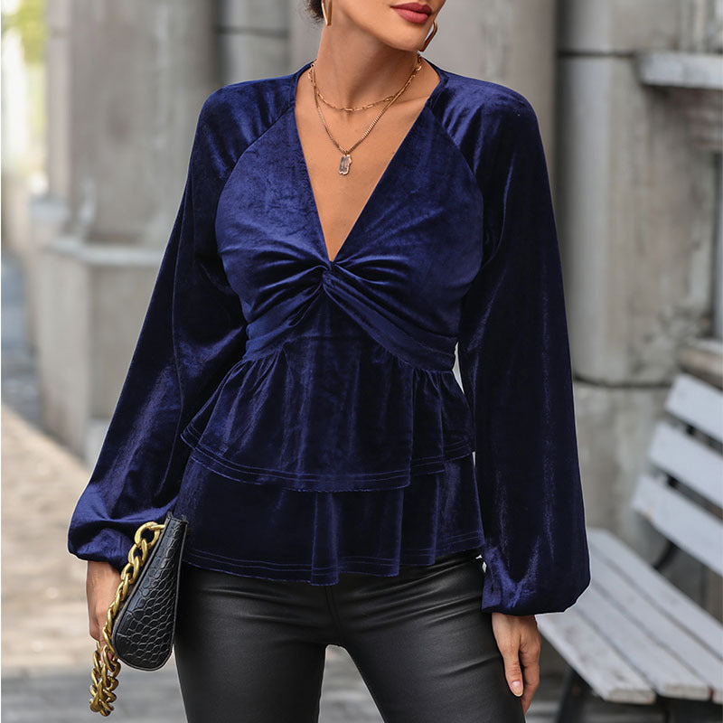 Ladies velvet blouse with deep V-neck, twist detail and two-tiered ruffle drape