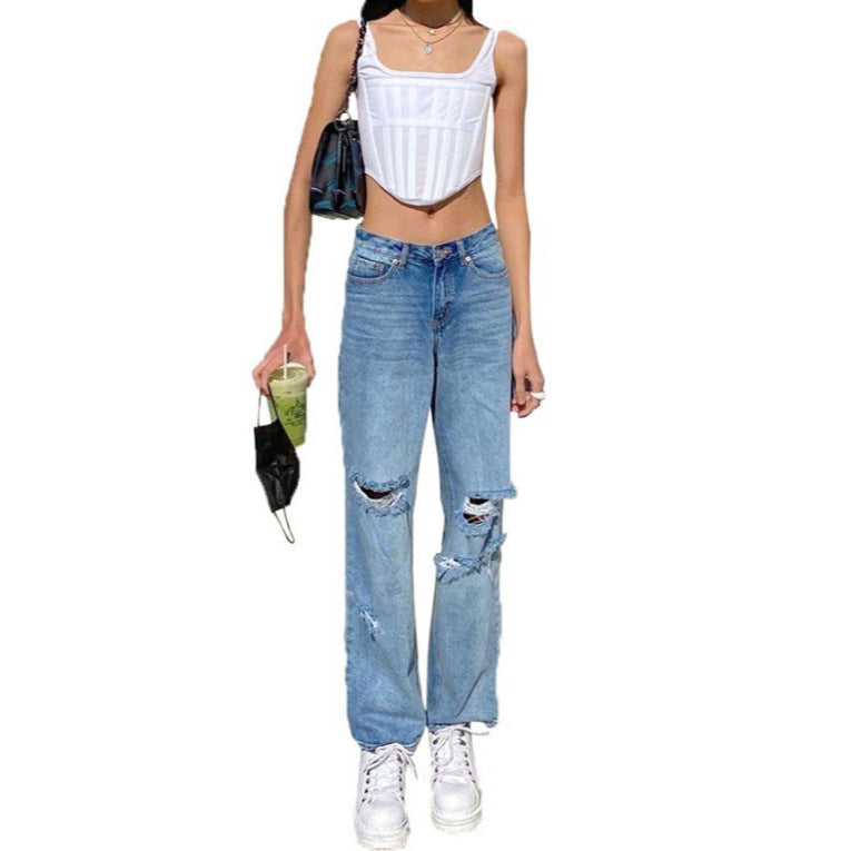 Women's high-cut wide jeans in baggy style with knee fraying and elastic hem Mune Fashion