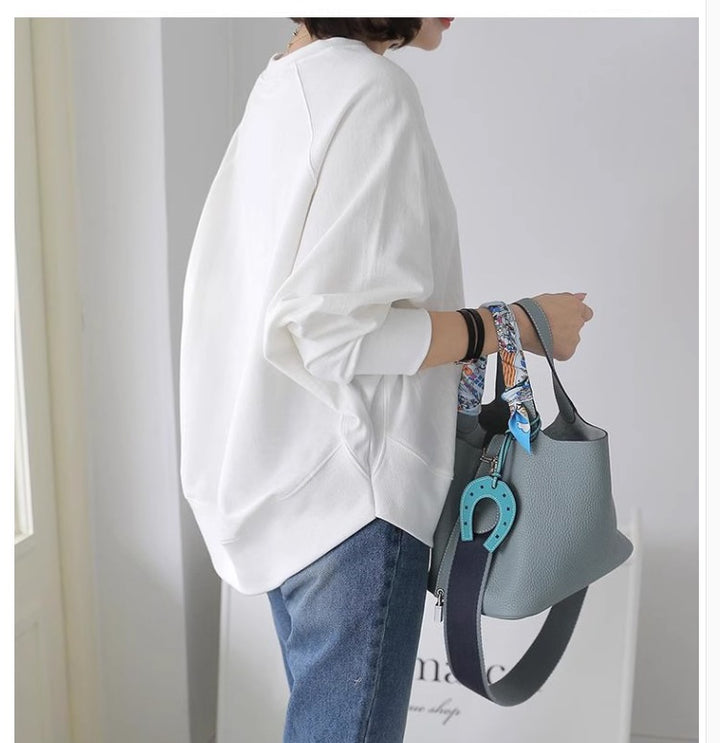 Women Oversize Sweatshirt with Raglan Sleeves, Rounded Hem and Side Slits Mune Fashion