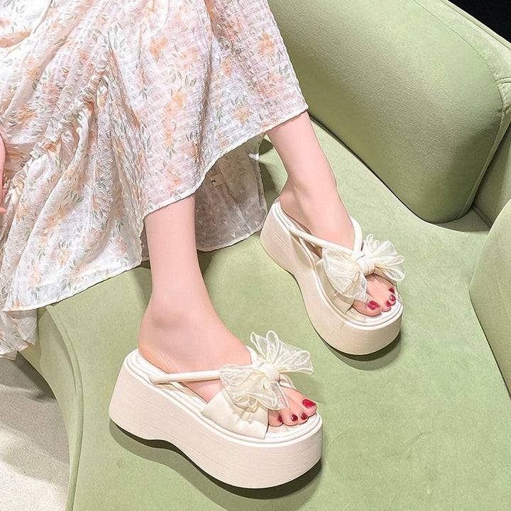 Women's platform slide sandal with high wedge sole and organza flower appliqué Mune Fashion