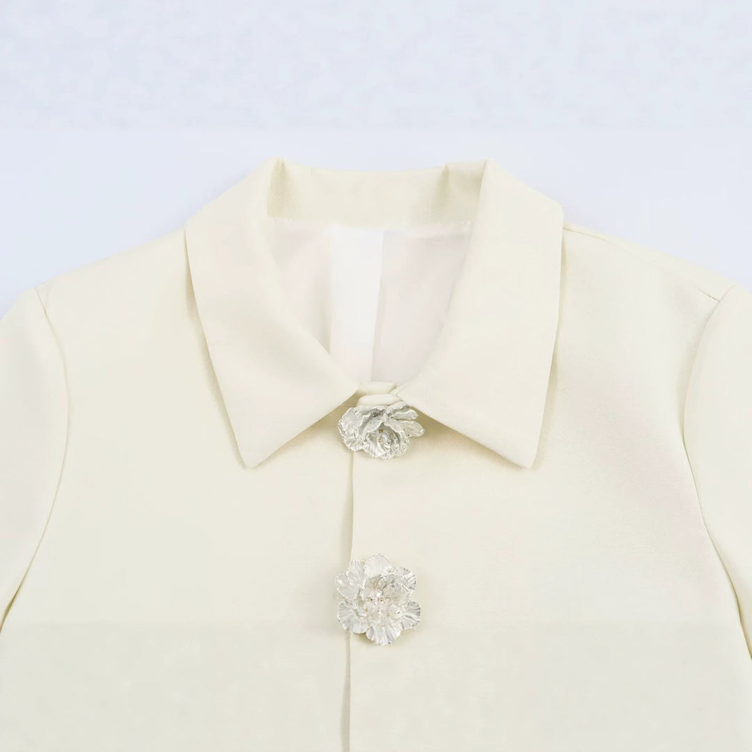 Women’s short blazer with decorative flower buttons and flap pockets Drune