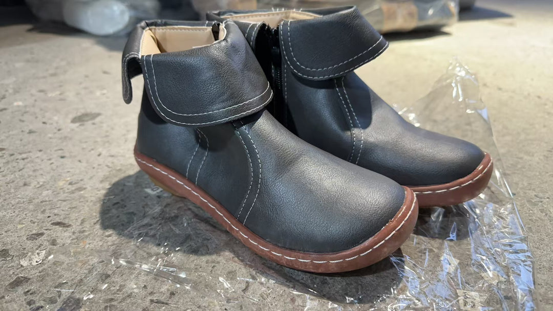 Women's soft leather booties with foldable strap, side zipper and flexible tread sole Mune Fashion