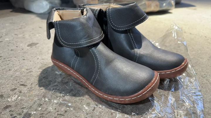 Women's soft leather booties with foldable strap, side zipper and flexible tread sole Mune Fashion