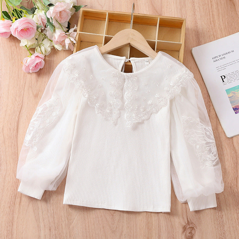 Girls blouse with airy tulle sleeves and delicate floral embroidery Mune Fashion