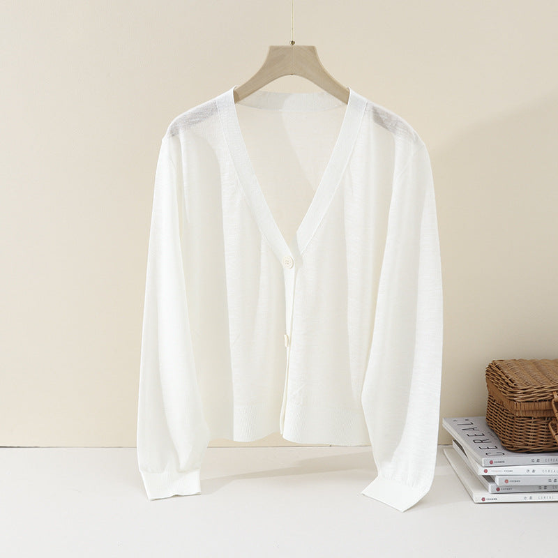 Women's Lightweight Oversized Cardigan made of fine knit with deep V-neck and decorative button placket Mune Fashion