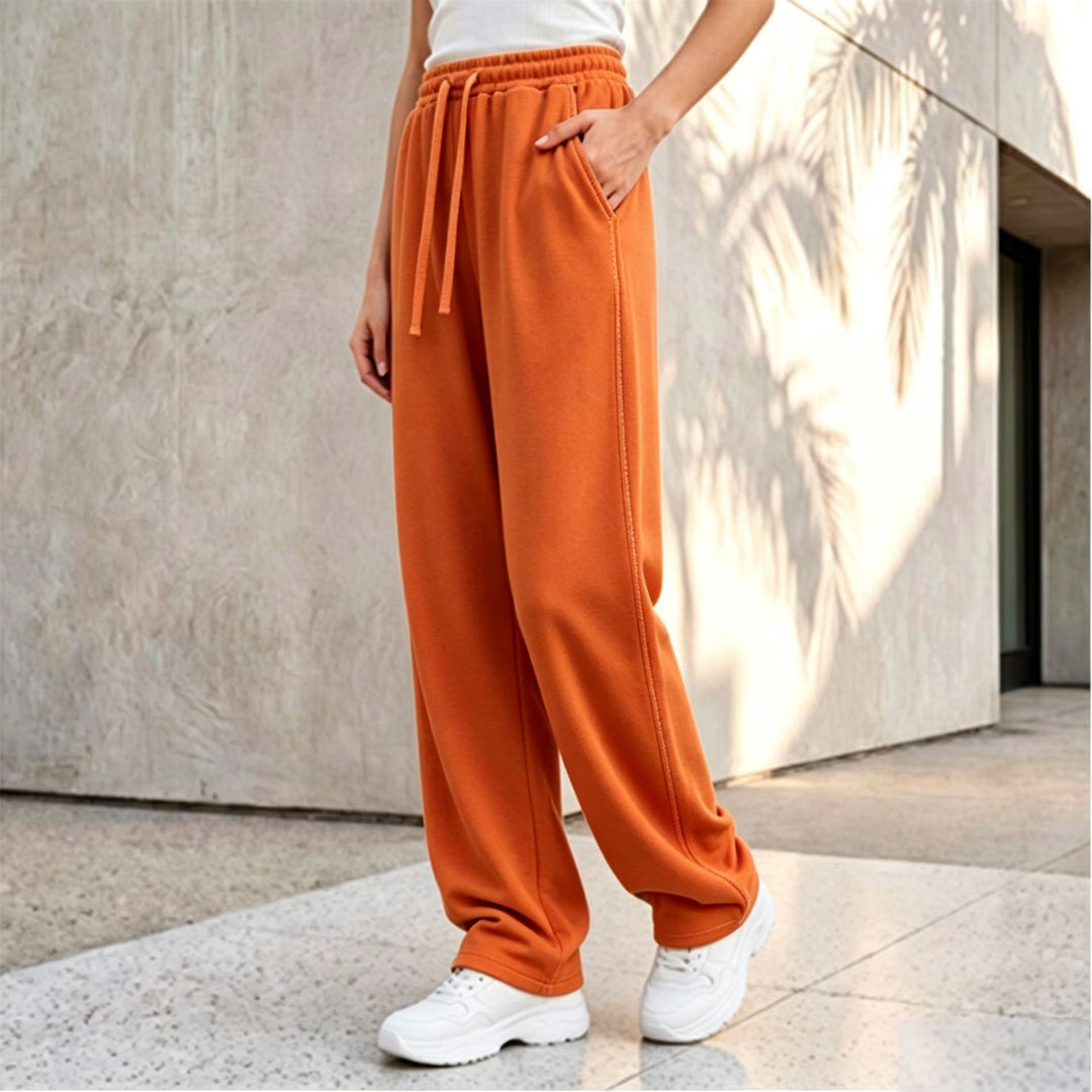 Women's wide lounge palazzo pants with high comfort waistband, drawstring, side pockets, and decorative side seam Mune Fashion