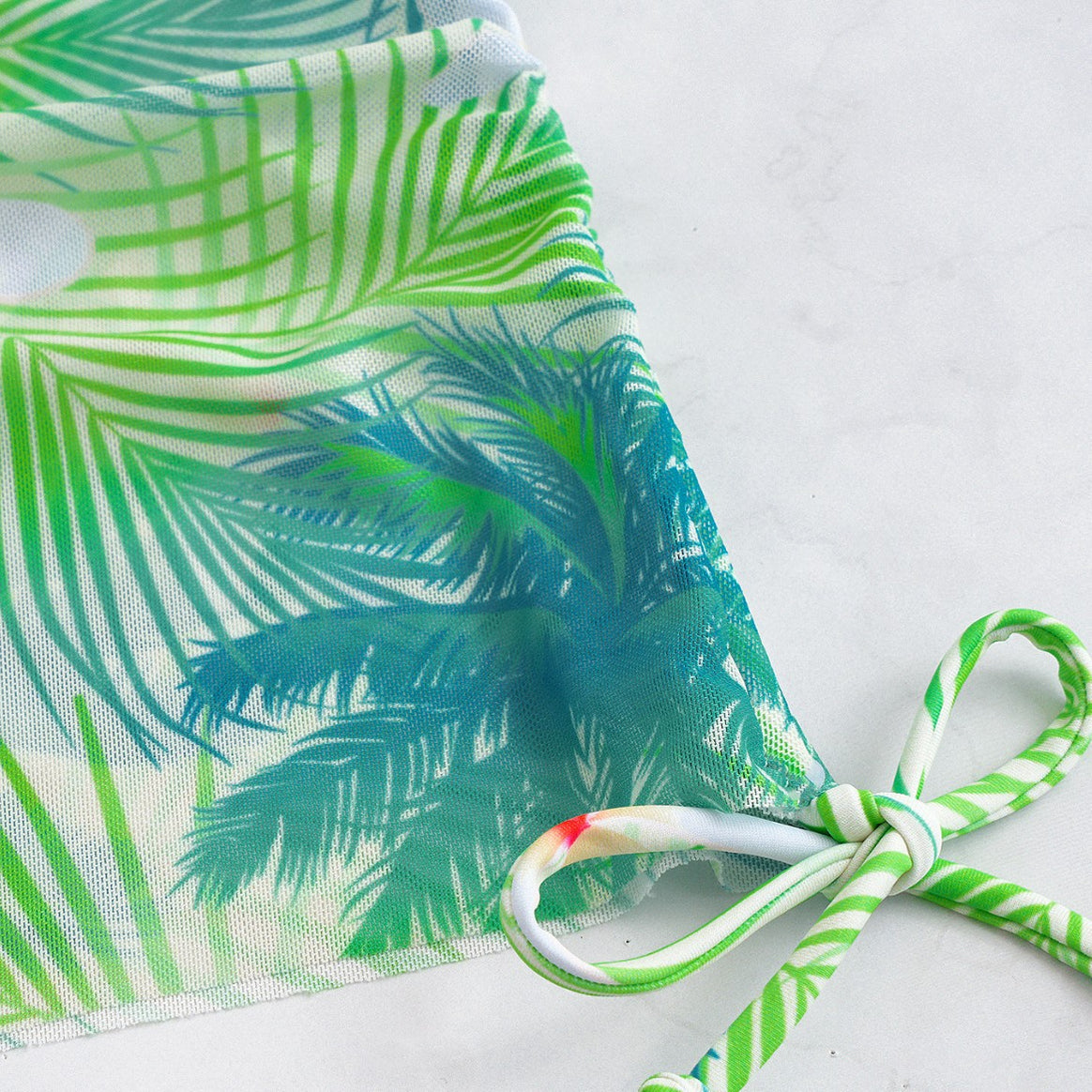 Ladies bikini set with elegant wrap skirt and tropical design Mune Fashion