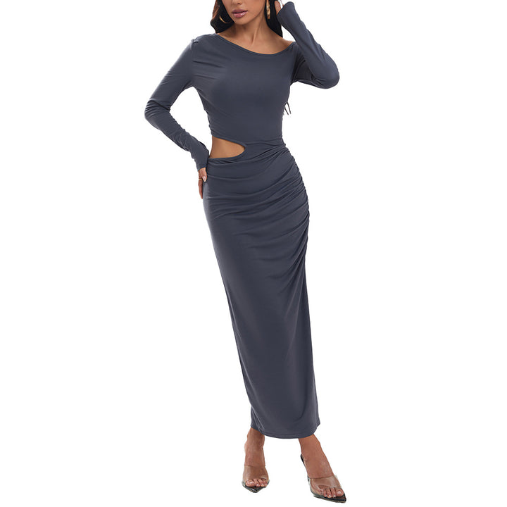Women's a fitted maxi dress with long sleeves, side cut-out, gathered hip, and high leg slit.