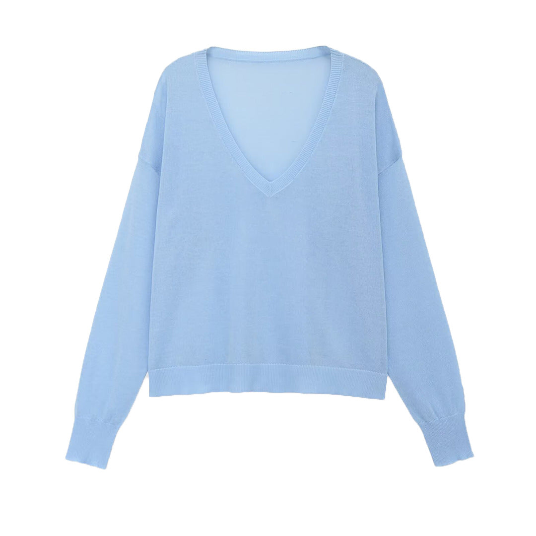 Women's oversized fine knit pullover with deep V-neckline and ribbed cuffs Mune Fashion