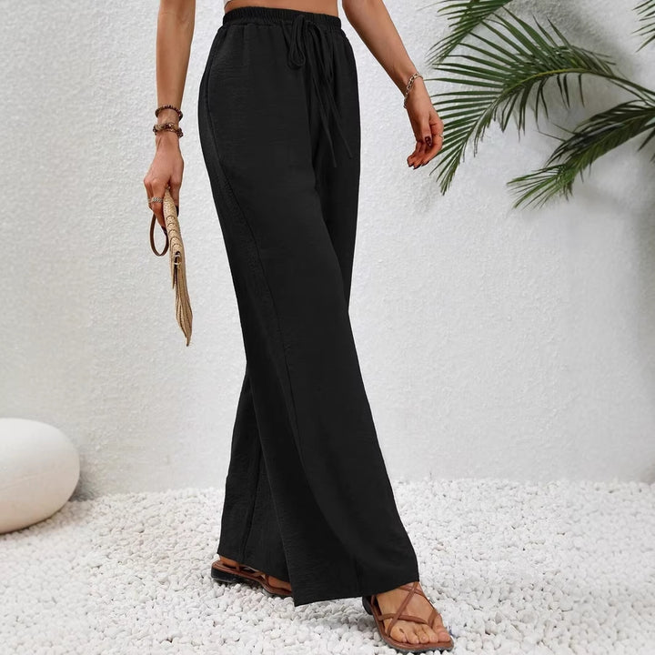 Ladies lightweight, loose-fitting beach pants with elastic waistband, drawstring and side pockets Mune Fashion
