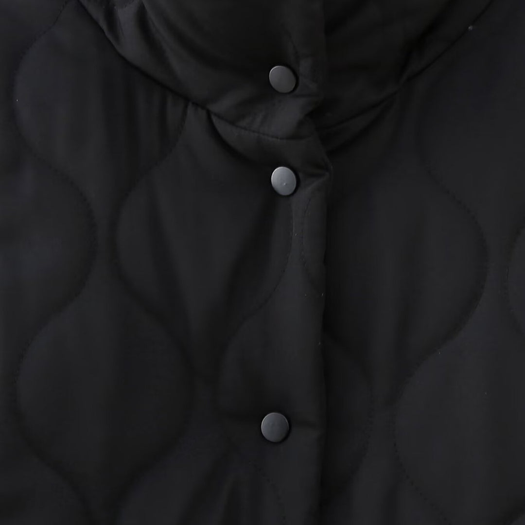 Women's short quilted jacket with high stand-up collar and ruffle pockets Mune Fashion