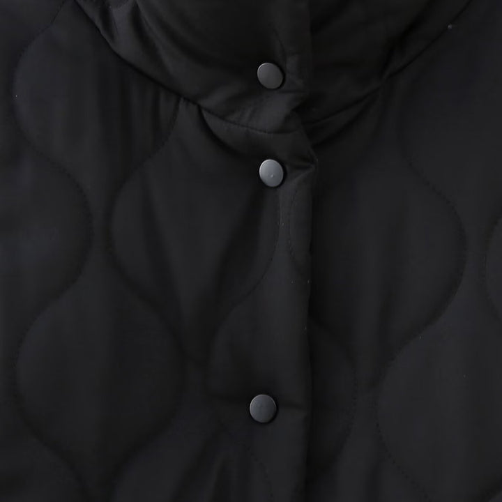 Women's short quilted jacket with high stand-up collar and ruffle pockets Mune Fashion