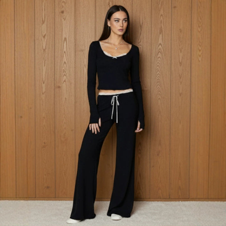Women's lounge pajama set made of viscose blend with lace trim and wide leg cut Mune Fashion
