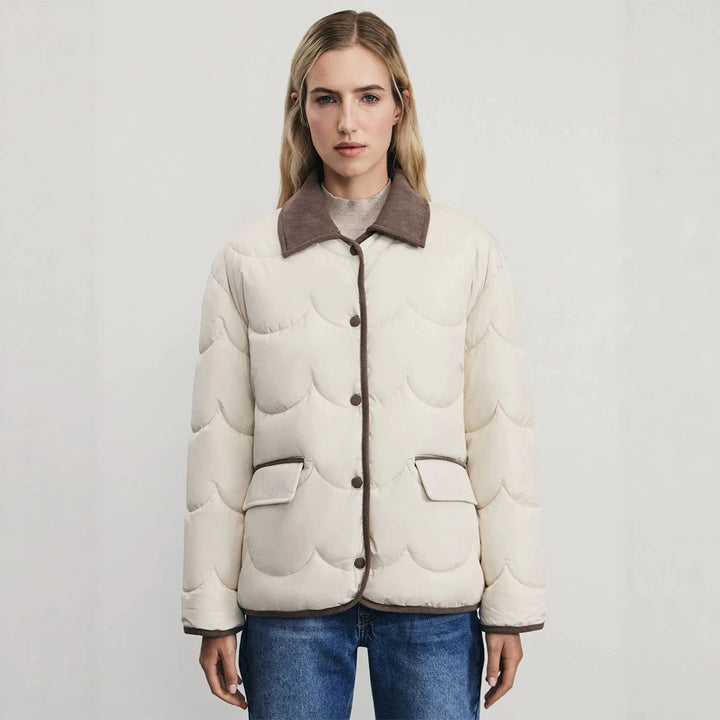 Women's quilted short jacket with wave quilting and cord collar Mune Fashion