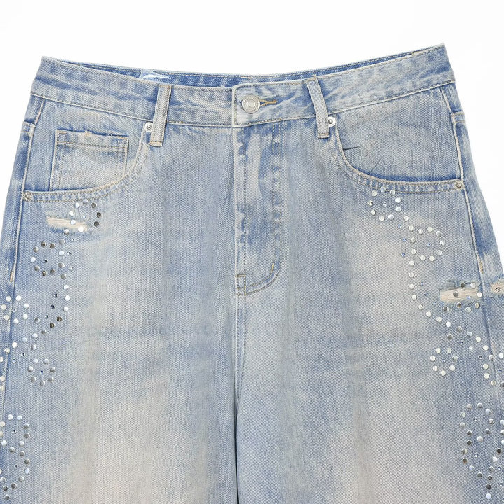 Women's jeans with a high waist, wide leg, rhinestone trim, and destroyed details Mune Fashion