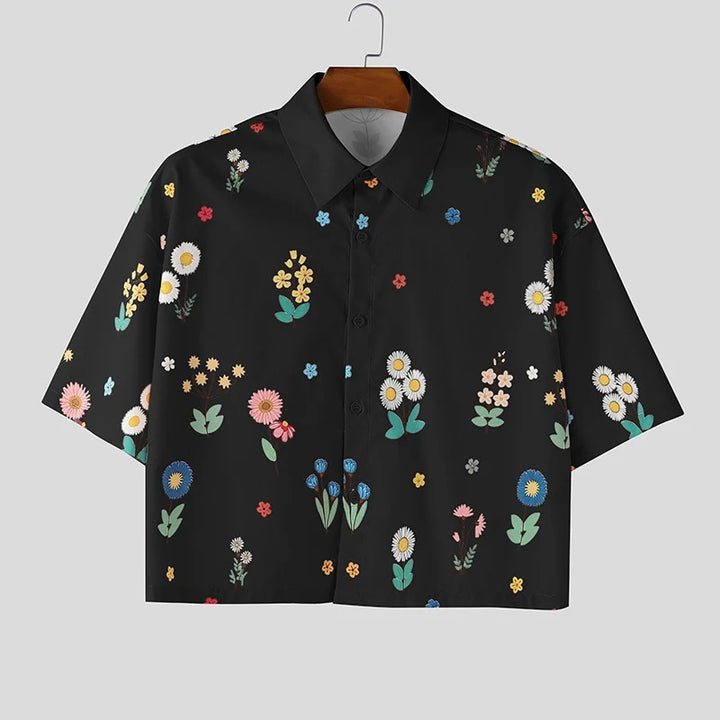Women's loosely cut short sleeve shirt blouse with floral all-over print, shirt collar and short hem Mune Fashion