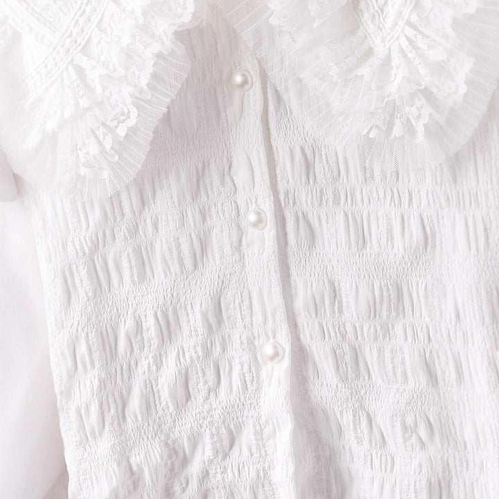 Women’s blouse with voluminous ruffled collar Mune Fashion