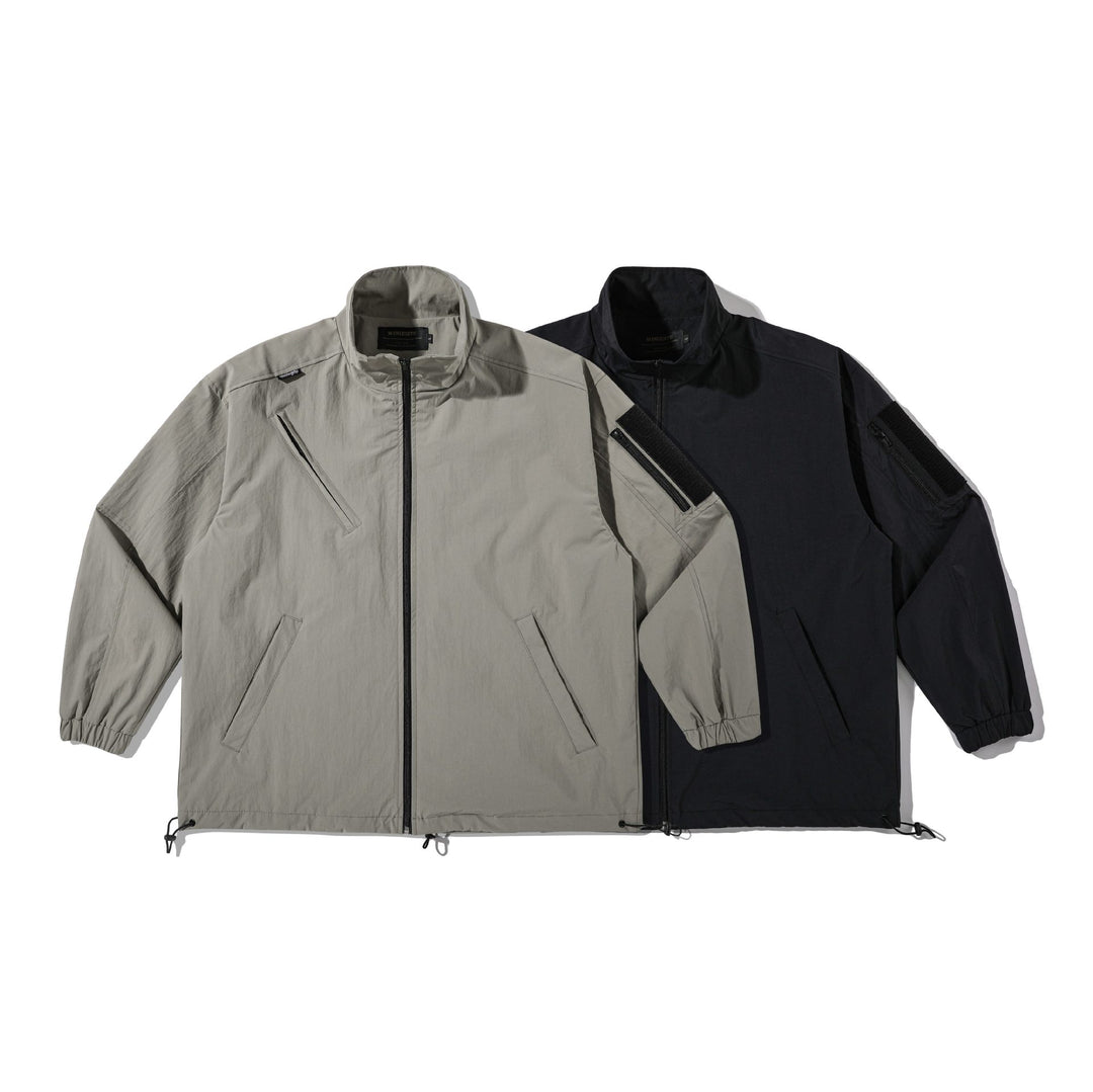 Unisex Lightweight Technical Wind Parka with Drawstring, Zipper Pockets and Sleeve Utility Pocket Mune Fashion