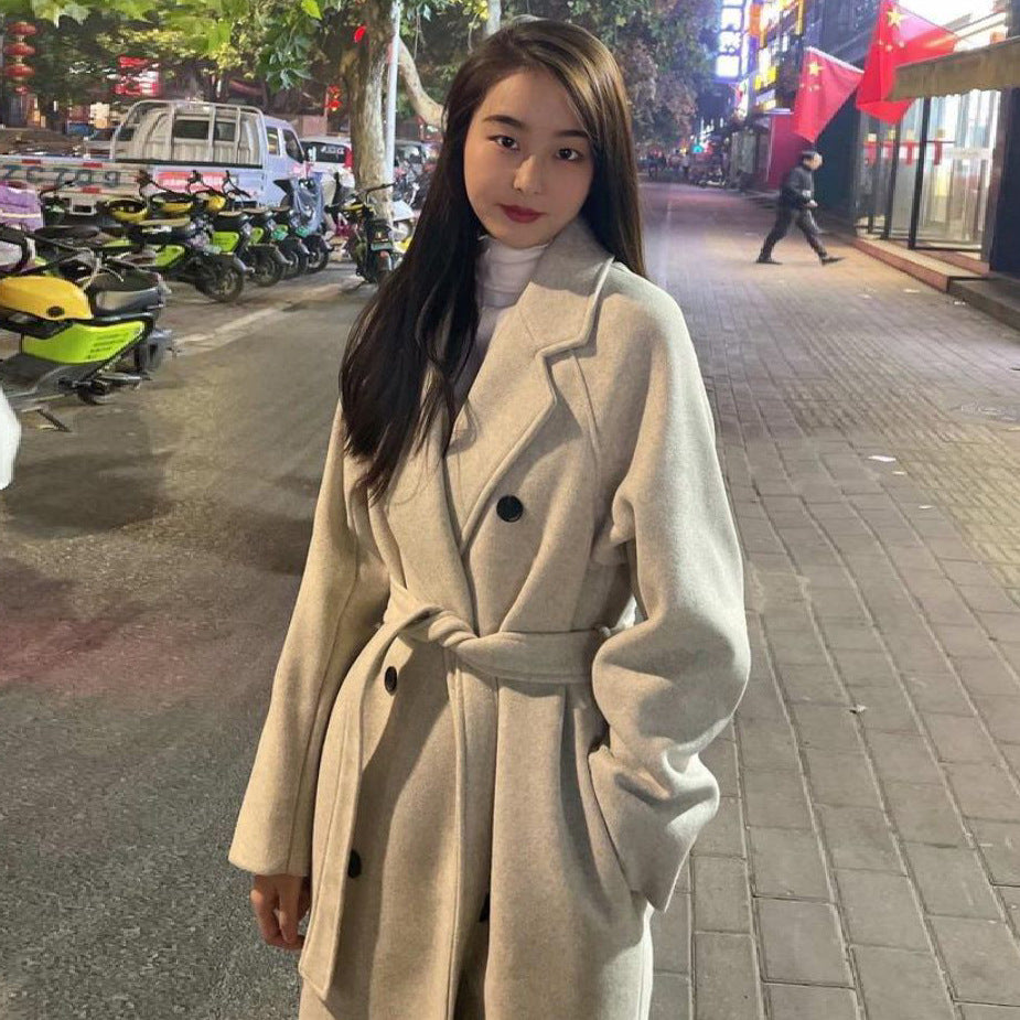 Women's longer classic wool blend coat in oversized cut with lapel collar and side pockets Mune Fashion