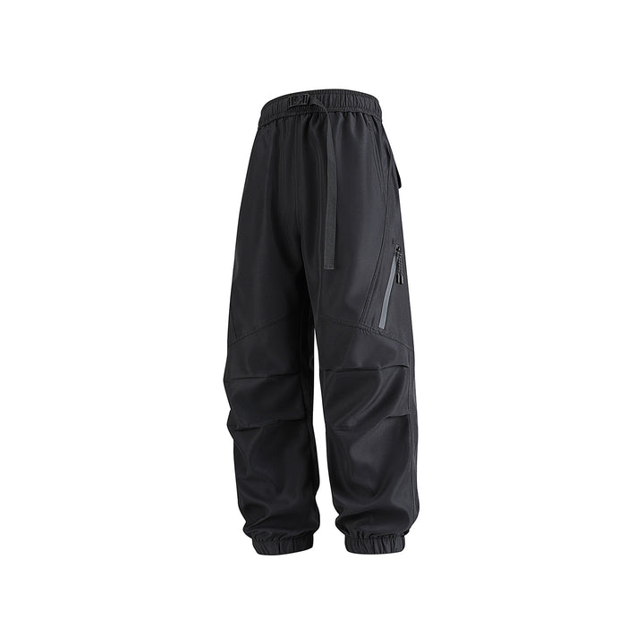 Men's loose technical cargo jogger pants with elastic drawstring waistband, patch flap pockets, and zippered leg pocket Drune