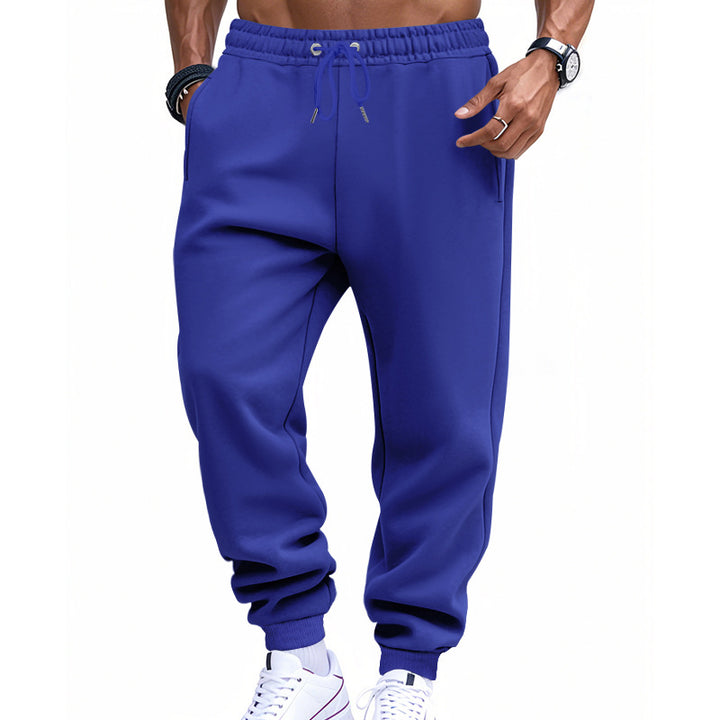Men's sporty sweat jogging pants with elastic tunnel drawstring waist, ribbed cuffs, and deep side pockets Mune Fashion