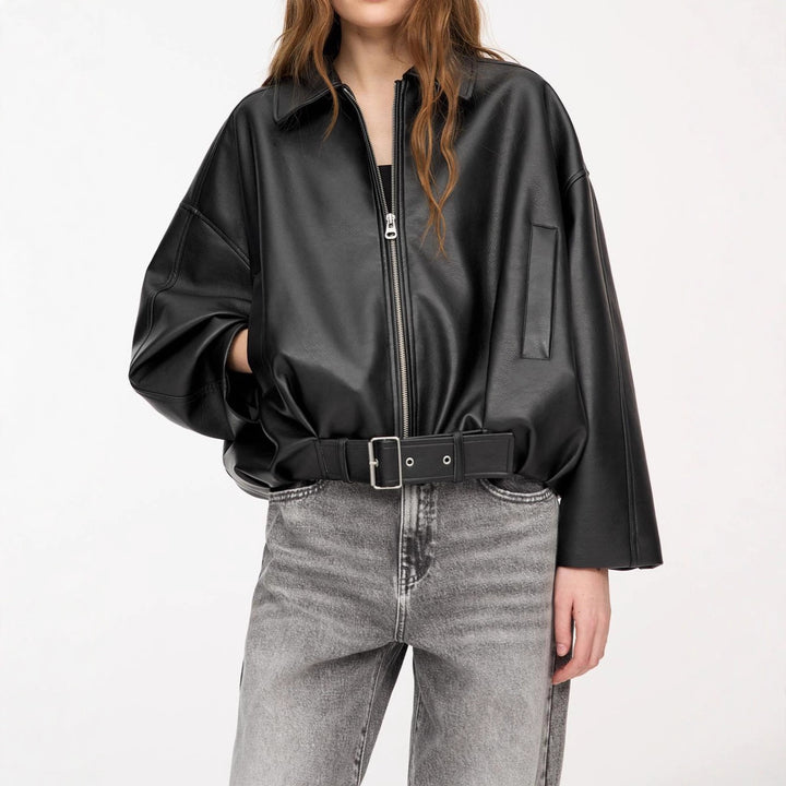 Women's short cut faux leather jacket with full zipper and figure-hugging belt Mune Fashion