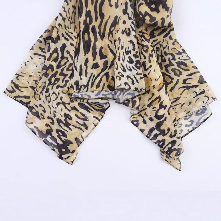 Ladies Asymmetric Wrap Blouse with Leopard Print, V-Neck, Balloon Sleeves, and Waistbelt Mune Fashion