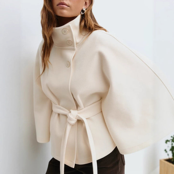 Women's Widely Cut Cape Coat with High Stand-up Collar, Button Placket, and Tie Belt Mune Fashion