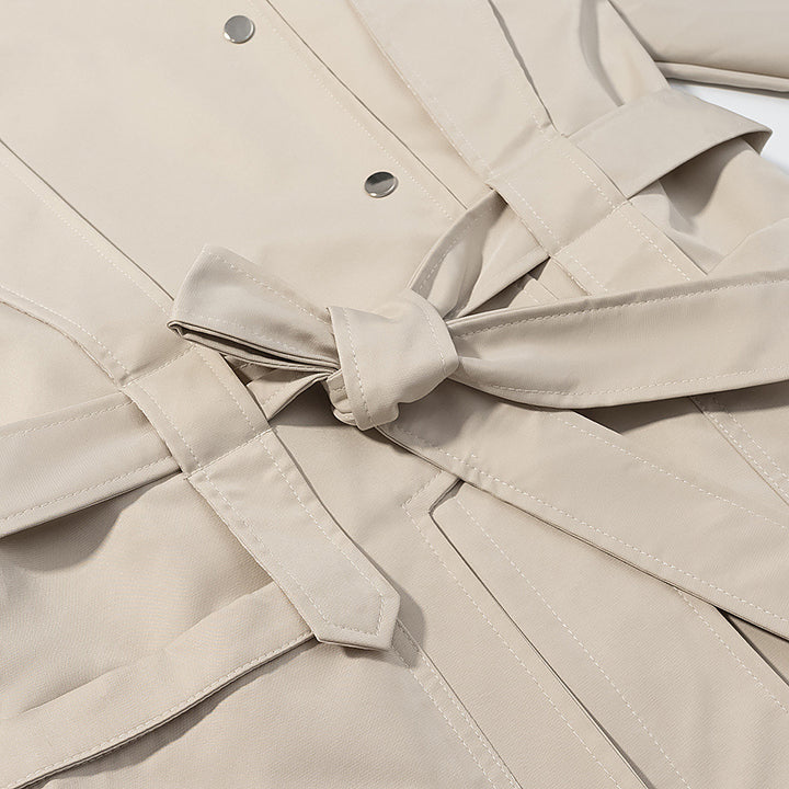 Ladies short trench coat with cape detail, stand-up collar and tie belt Mune Fashion
