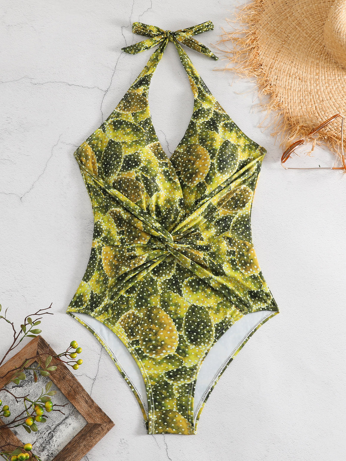 Women's one-piece swimsuit with playful knot design and floral pattern Mune Fashion