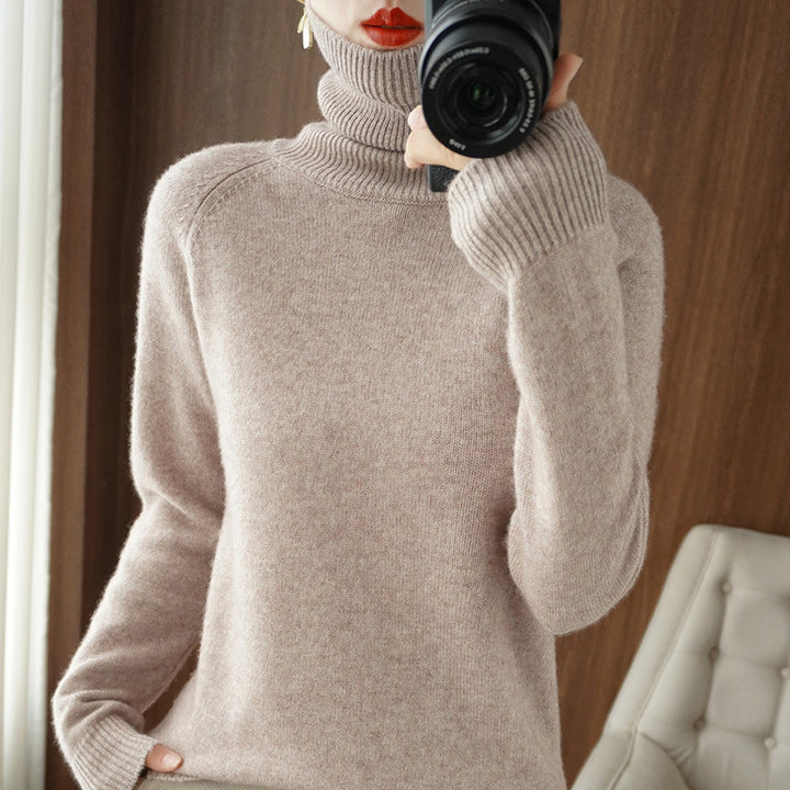 Women's turtleneck sweater made of soft wool blend with extended cuffs Mune Fashion