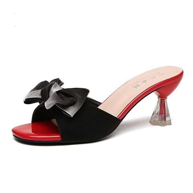 Women nan elegant mule with decorative bow application, sculptural transparent heel and lacquered comfort footbed Mune Fashion