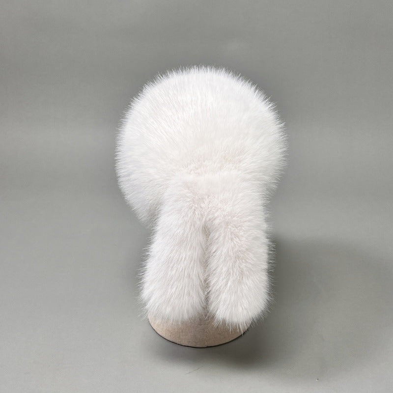 Women’s plush faux fur trapper hat with earflaps and decorative tail Mune Fashion