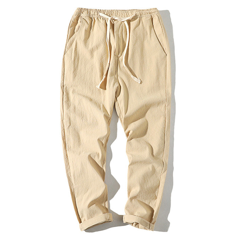 Men's lightweight linen trousers with elastic waistband and drawstring, tapered fit and roll-up hem Mune Fashion