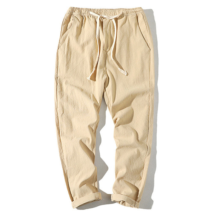 Men's lightweight linen trousers with elastic waistband and drawstring, tapered fit and roll-up hem Mune Fashion