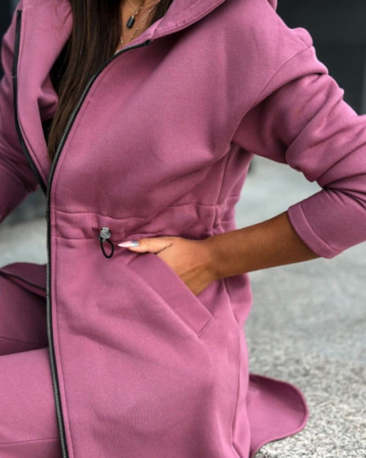 Women's long sweat hoodie jacket with two-way zipper, drawstring waist, side pockets, and side slits Mune Fashion