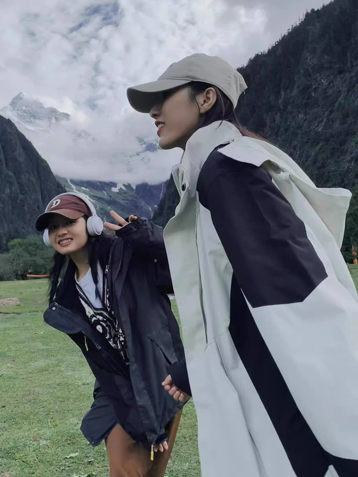 Women's two-layer waterproof outdoor jacket with hood, breathable membrane and adjustable waist Mune Fashion