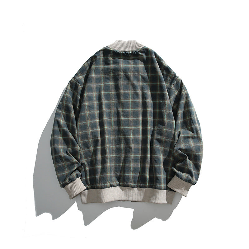 Unisex boxy bomber jacket in herringbone look with ribbed cuffs, flap pockets, and concealed snap button placket Mune Fashion