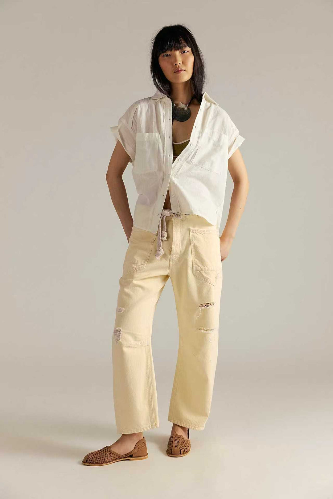 Women's high-waisted jeans in a loose fit with patch pockets and drawstring Mune Fashion