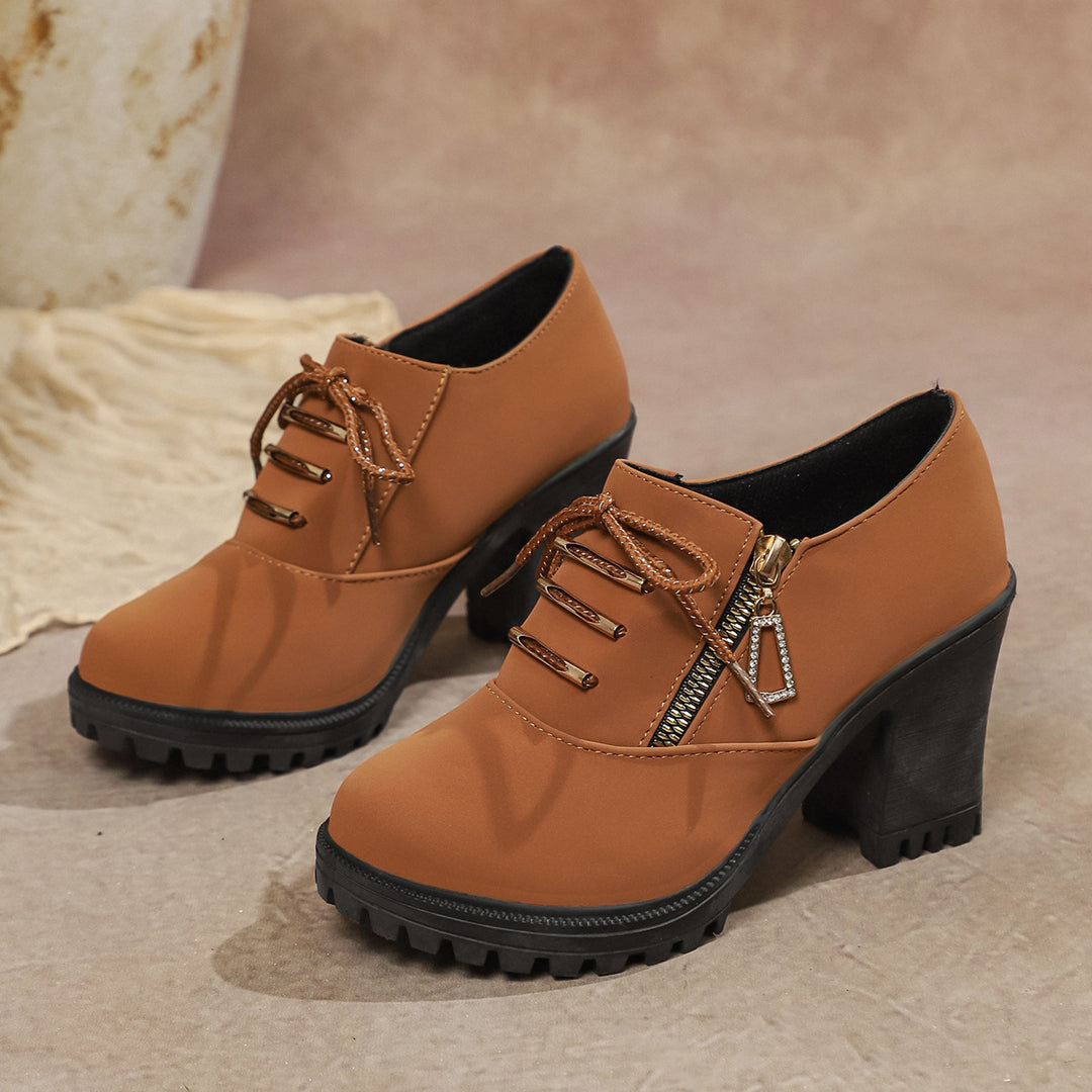Women's elegant lace-up booties with sturdy block heel, side zipper, and decorative pendant Mune Fashion