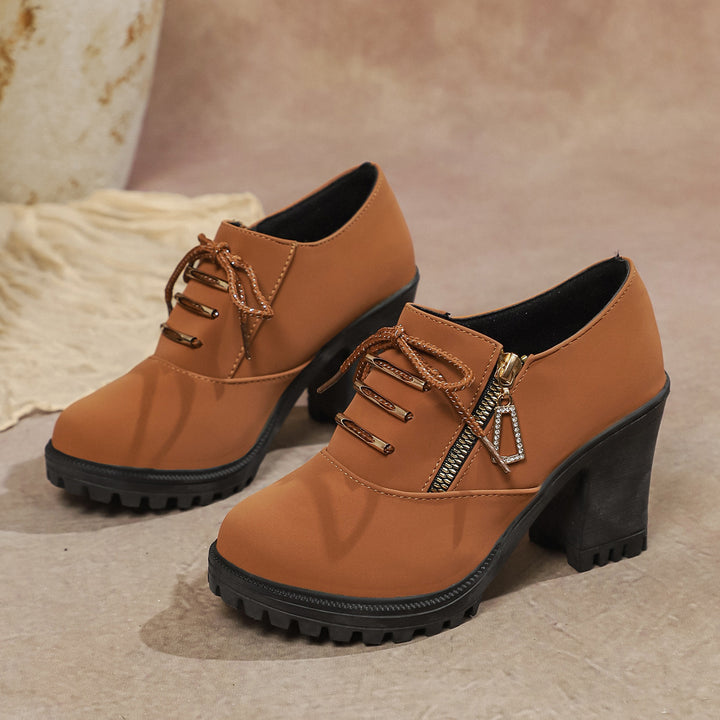 Women's elegant lace-up booties with sturdy block heel, side zipper, and decorative pendant Mune Fashion