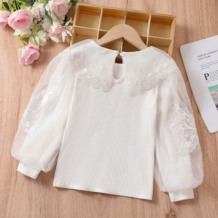 Girls blouse with airy tulle sleeves and delicate floral embroidery Mune Fashion