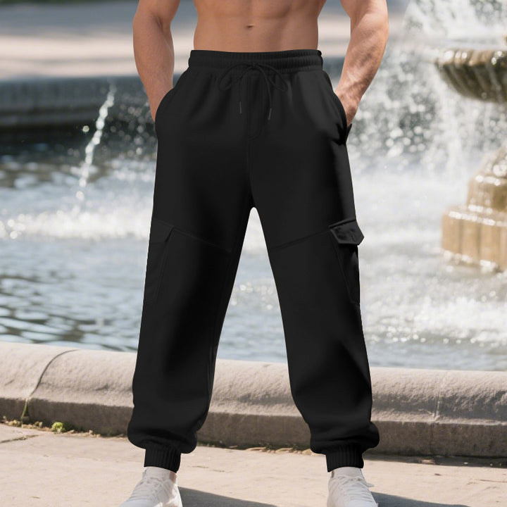 Men's urban-military cargo joggers with knee-quilted inserts, side flap pockets, and ribbed leg openings Mune Fashion