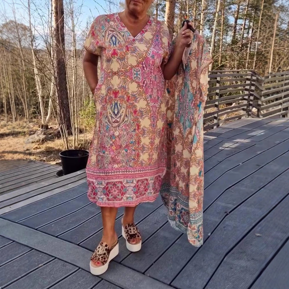Women's airy V-neck dress in paisley print with side pockets and matching pareo Mune Fashion
