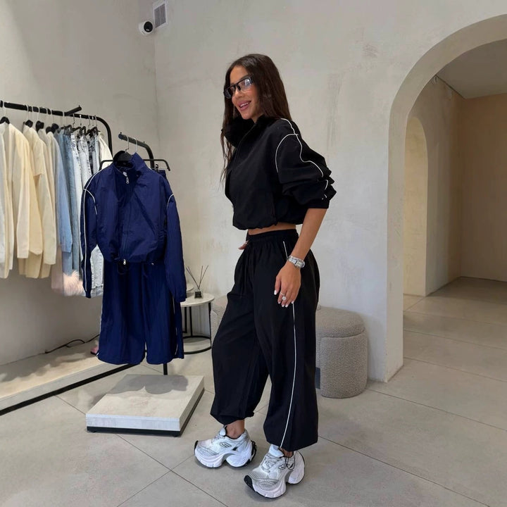 Women Short-Cut Windbreaker Set with Loose Track Pants and Contrast Piping Mune Fashion