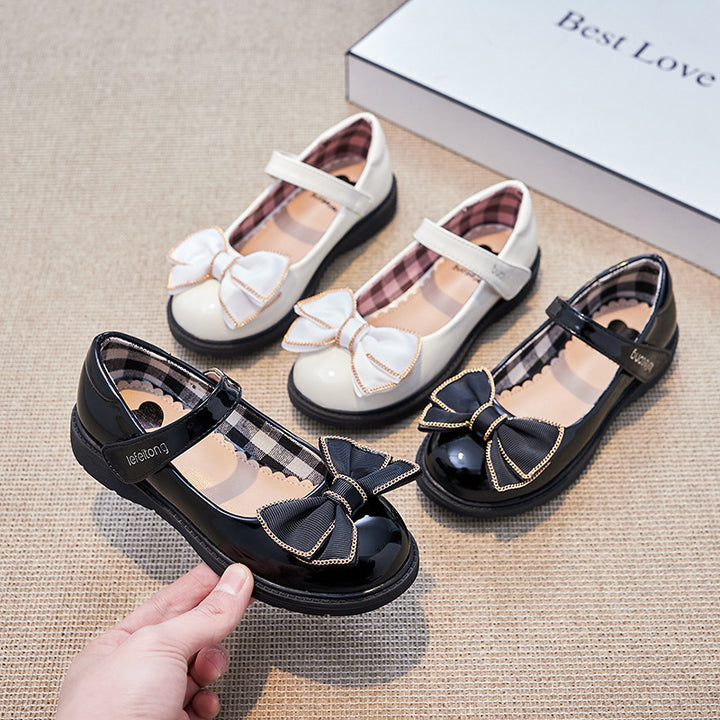 Girls' ballerina shoes with adjustable strap and decorative bow accent Mune Fashion